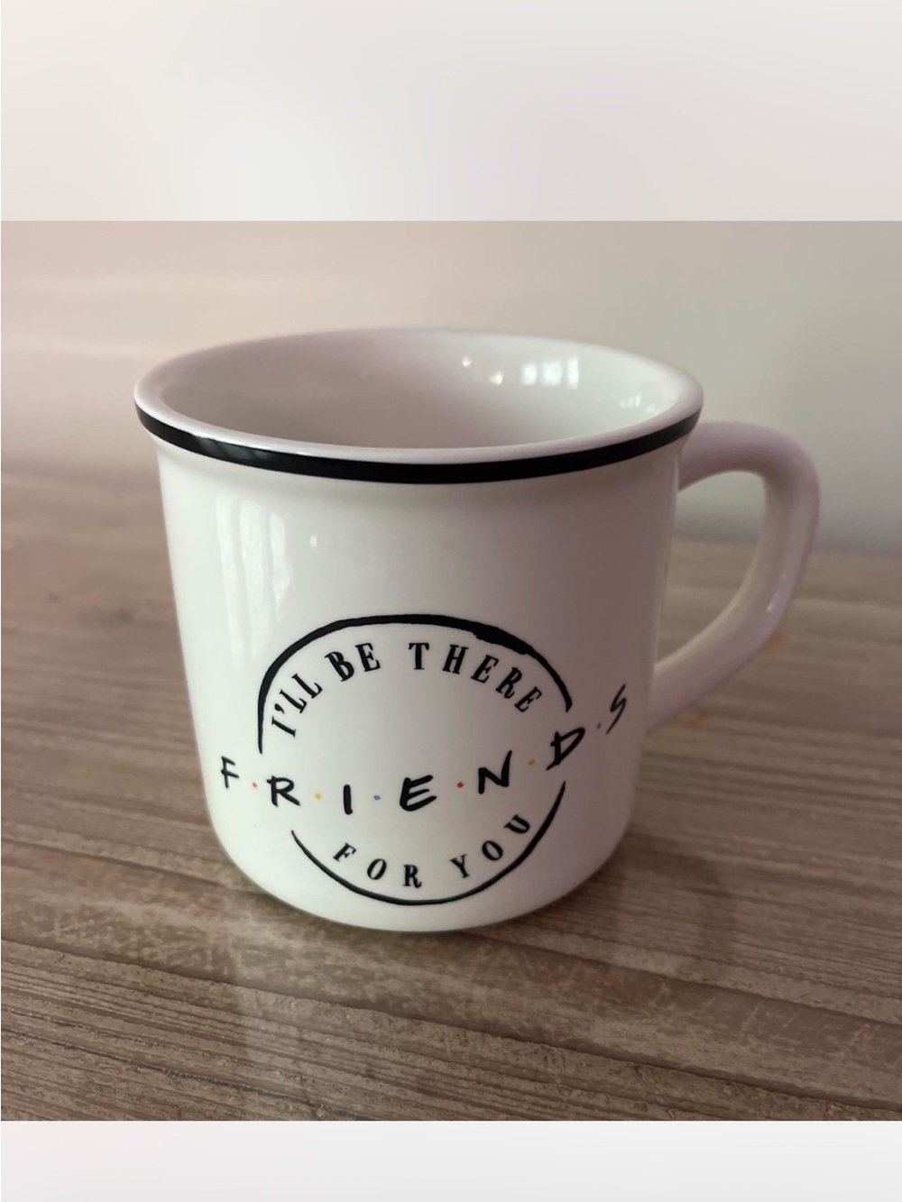 FRIENDS White Ceramic Mug with Black Rim and Logo